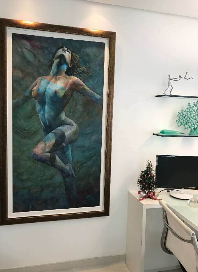 quadro com uma mulher e sua silhueta na parede do Consultório Dra. Luciana Pepino
